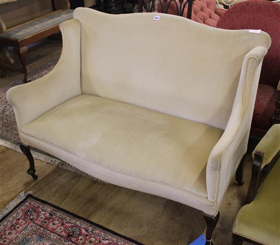 Small wing-back sofa